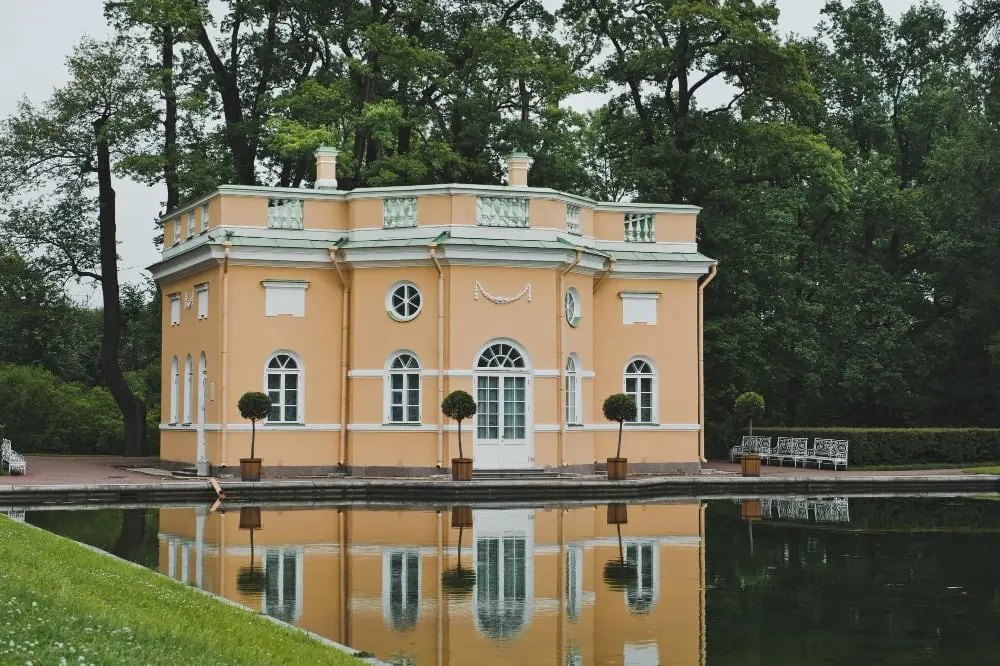 Classical pavilion reflected in a lake
