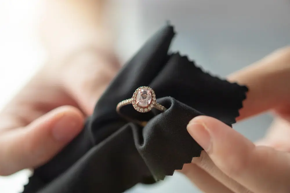 high value diamond ring held in cloth