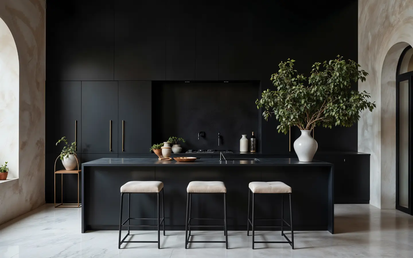 Modern dark kitchen with an island and bar stools