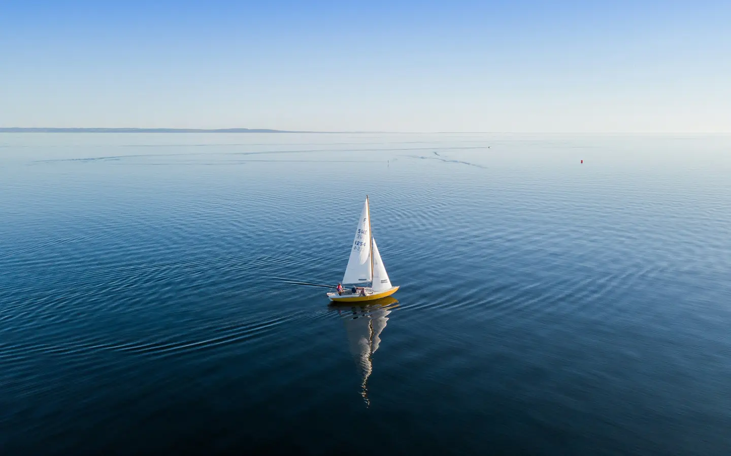 Sailing boat on a calm sea