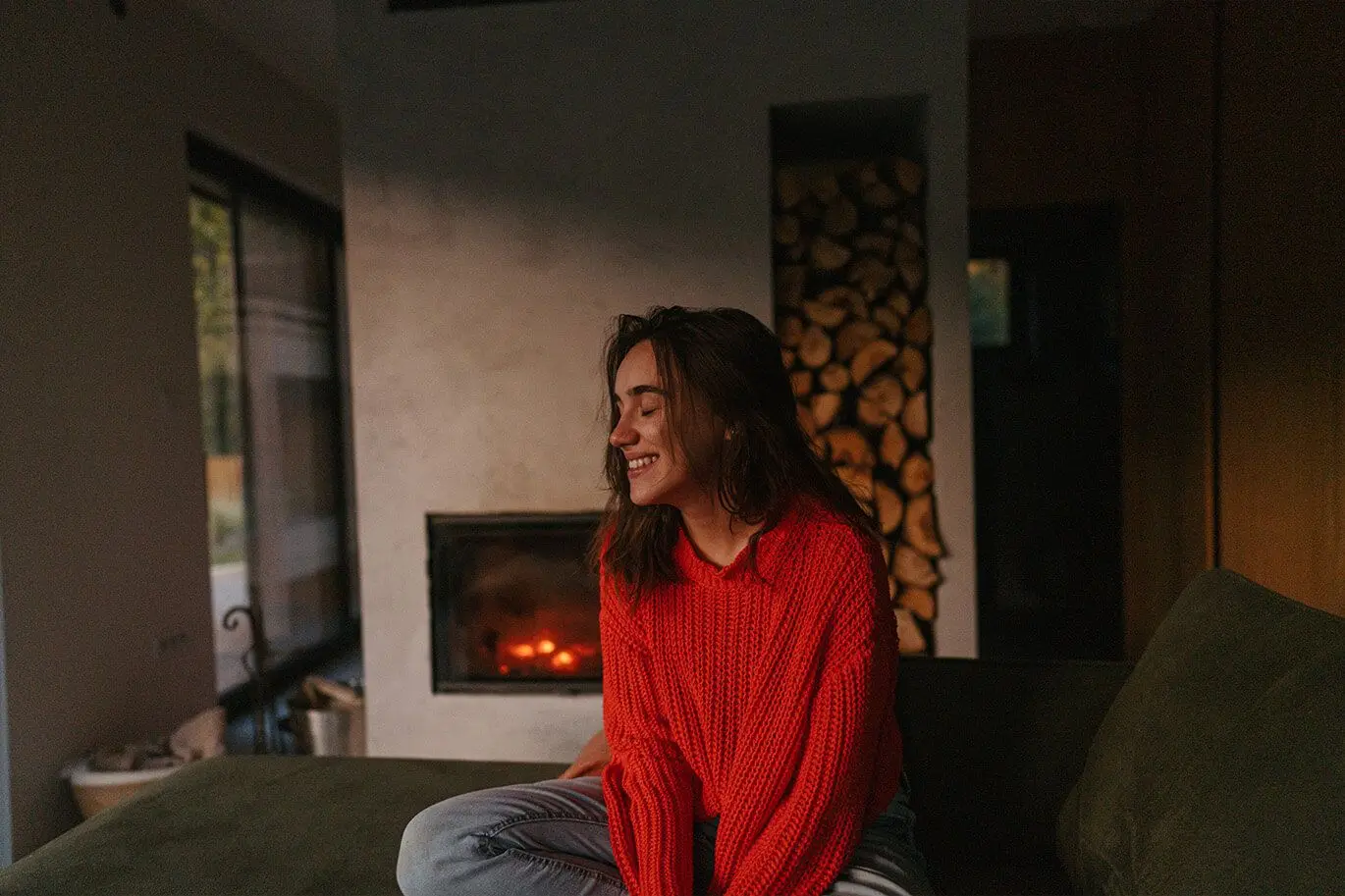 woman wearing red in living room