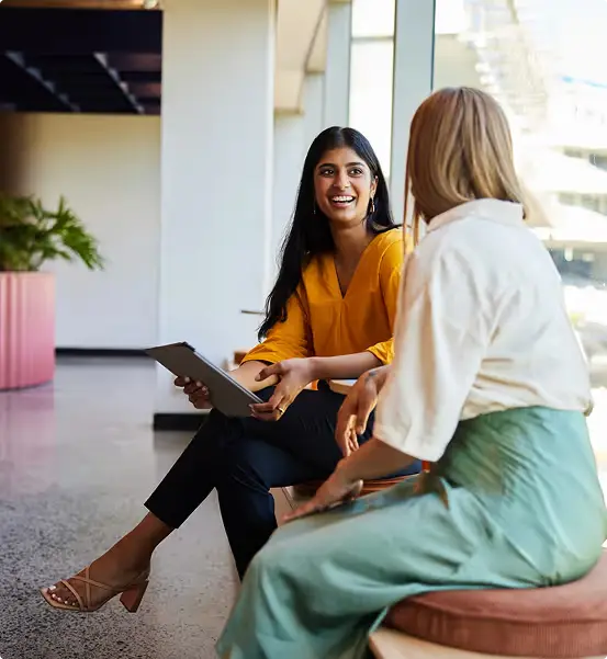 A Rivr client adviser talking with a client