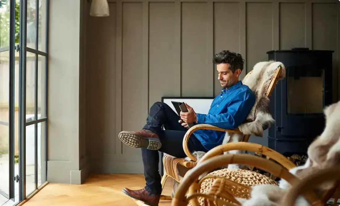 Man reclining in a home interior