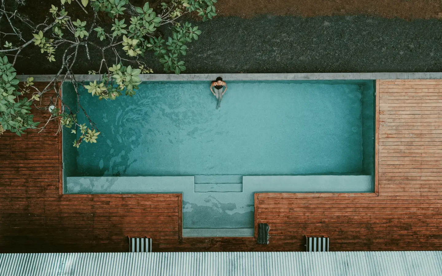 Brick-edged swimming pool seen from above
